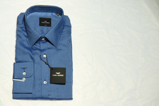 blue polo shirt on white textile