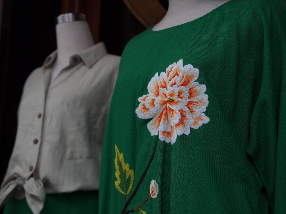 a close up of a dress on a mannequin