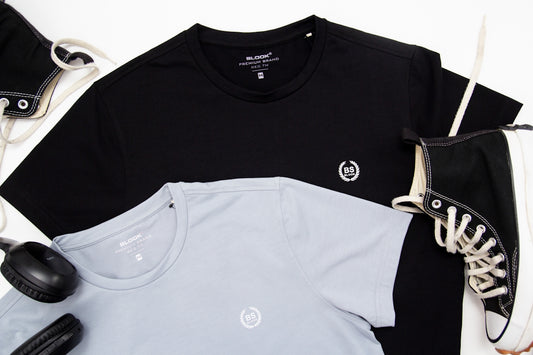 a pair of headphones, a pair of sneakers, and a t - shirt