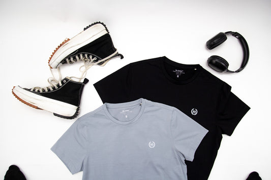 a pair of sneakers, a pair of headphones, and a t - shirt