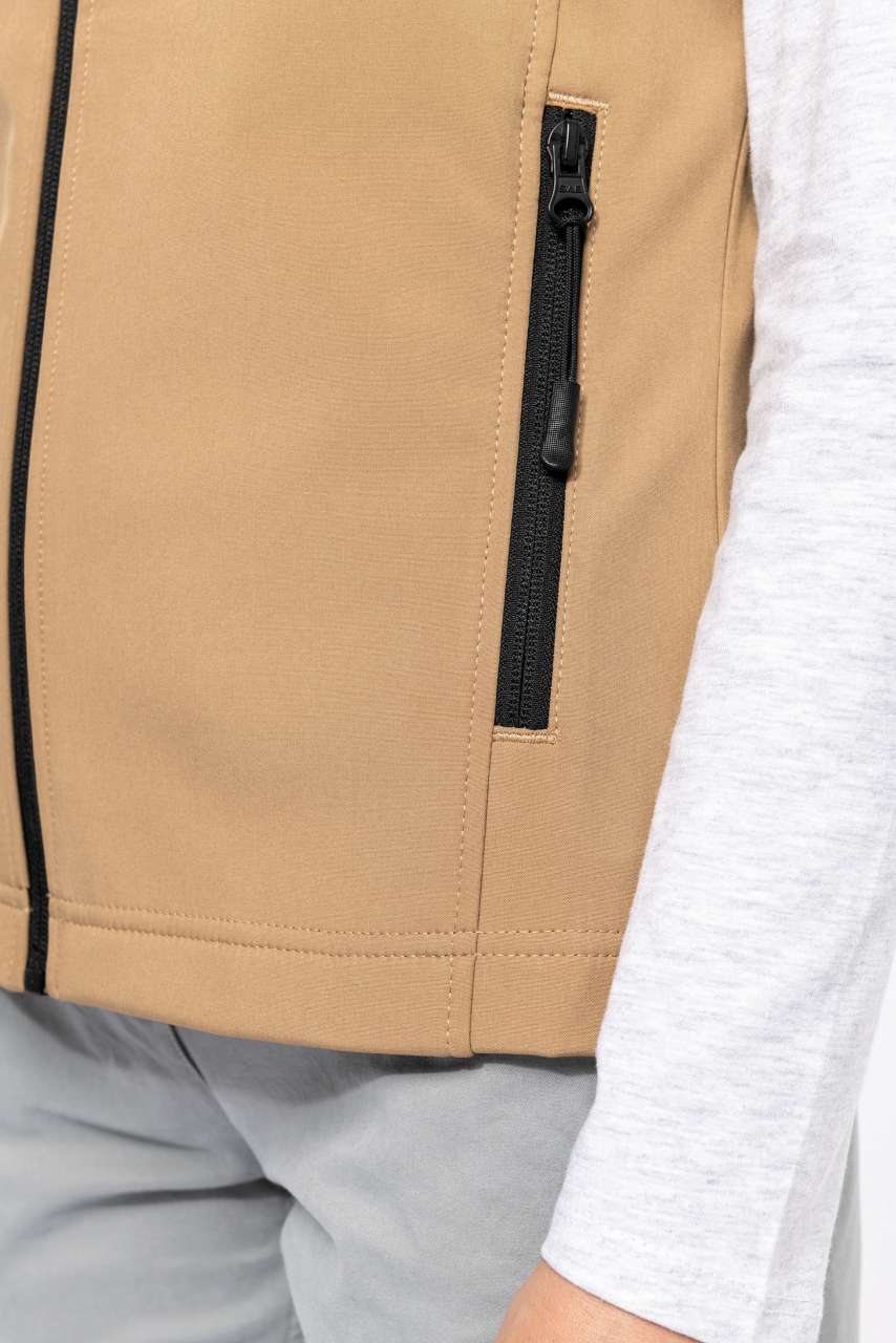 KA404 - LADIES' SOFTSHELL BODYWARMER – Mărimi 2XL, 3XL, 4XL, S, M, L